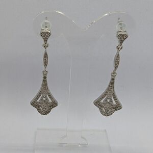 Silver Toned Dangle Earrings With Clear Stones